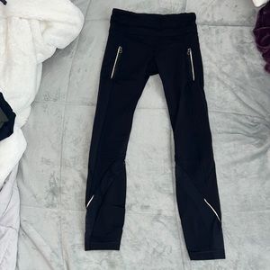 Lululemon cropped black with mesh leggings and zipper pockets